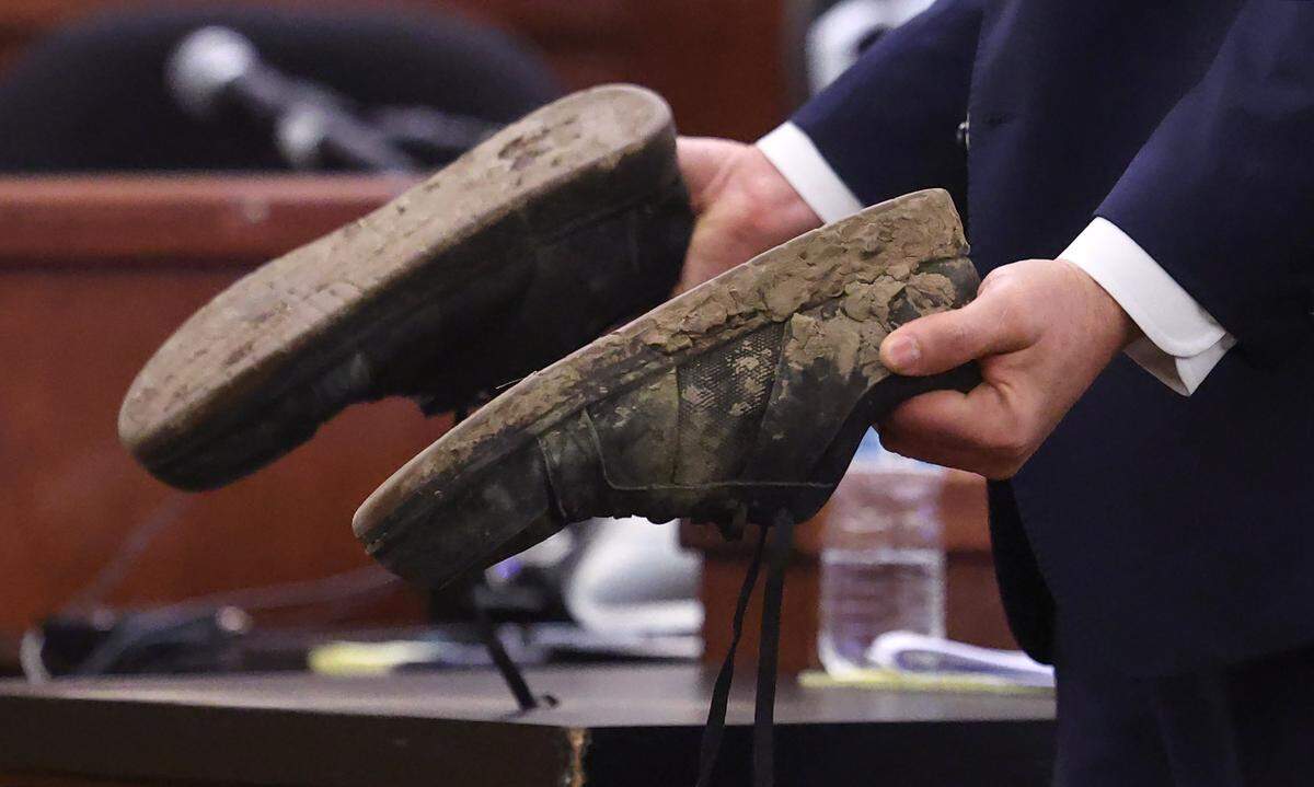 Wise County District Attorney James Stainton holds the shoes Tanner Horner wore when he killed Athena Strand during the punishment phase of the trial on Tuesday, May 5, 2026, at the Tim Curry Criminal Justice Center in Fort Worth. Horner pleaded guilty to capital murder in the November 2022 strangulation killing of 7-year-old Athena Strand.