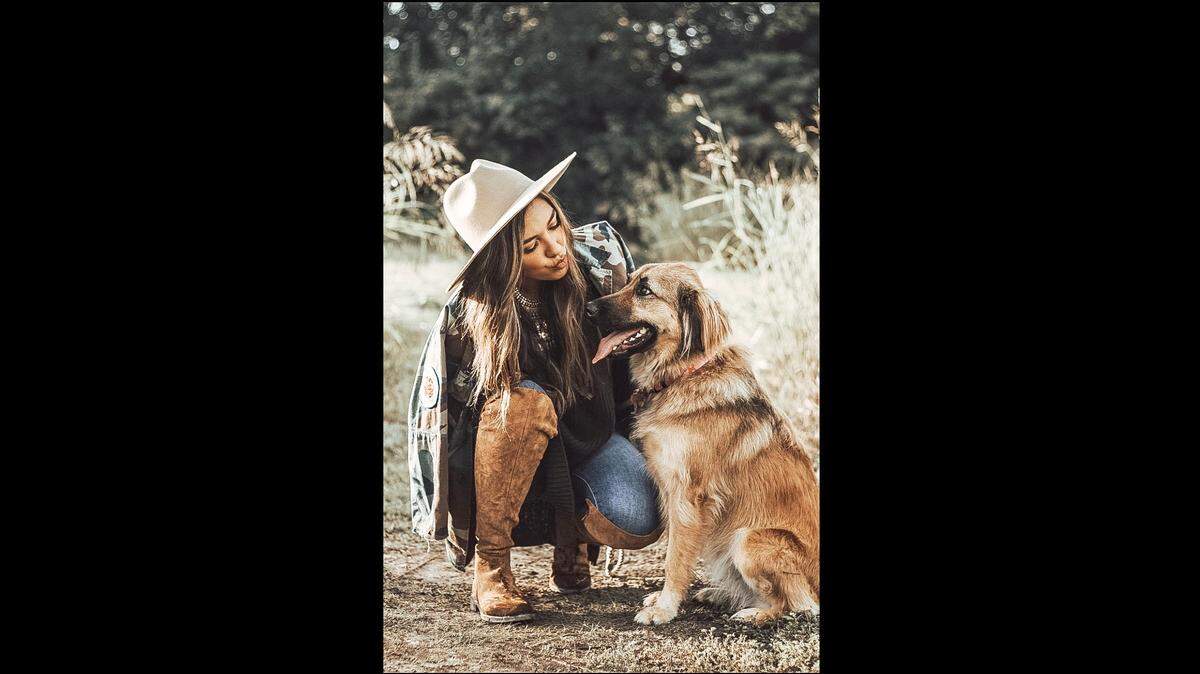 Jadyn Wakamatsu, a 20-year-old Dallas resident who attends Dallas Baptist University student, is the first ‘puptern’ at Mutts Canine Cantina. She says the flexible schedule allows her to continue focusing on her studies. The $100 an hour pay isn’t bad, either.