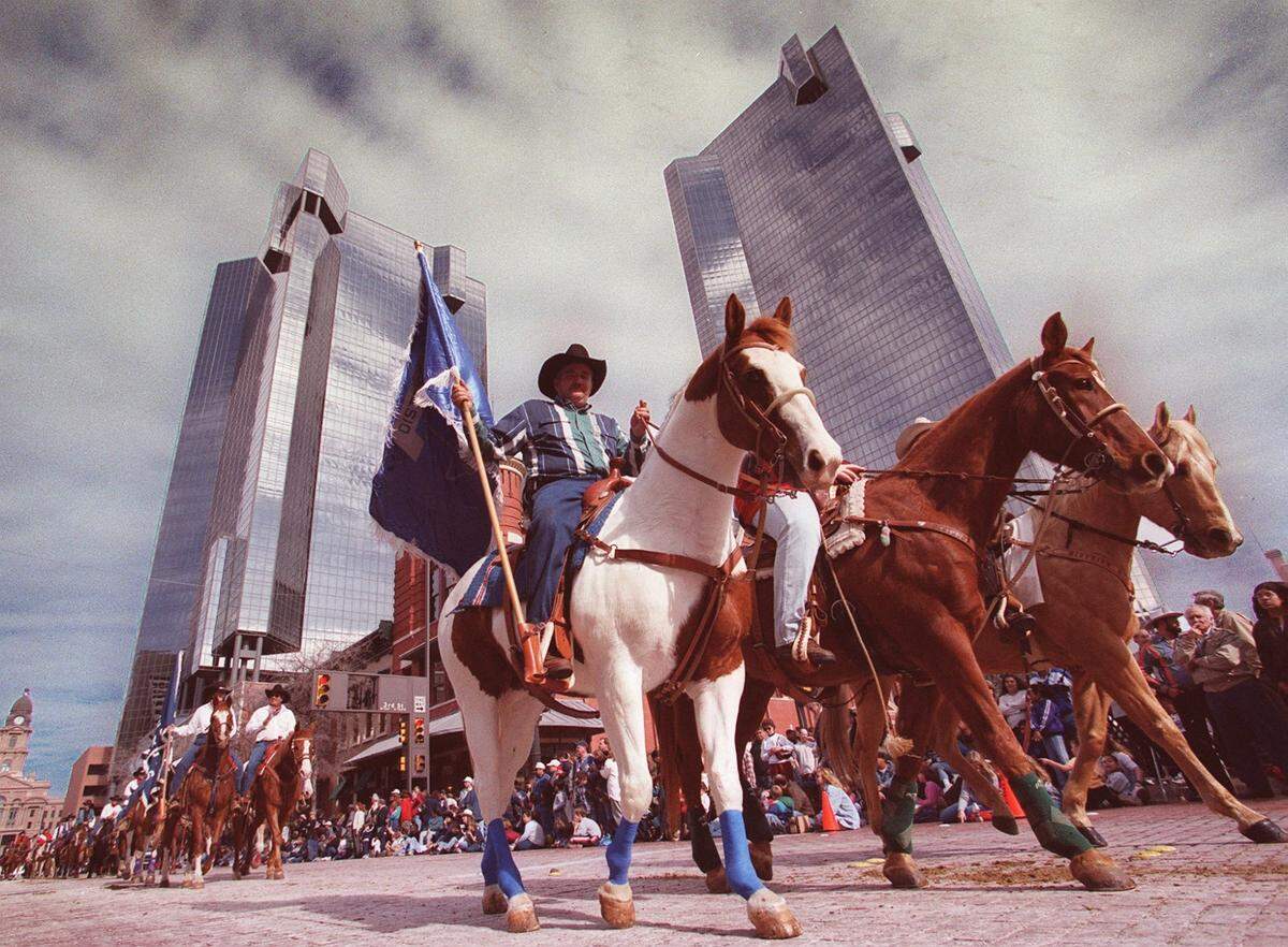 Jan. 22, 2000: Members of the Pure Country Riding Club make their way down Main Street in Fort Worth’s Stock Show Parade
