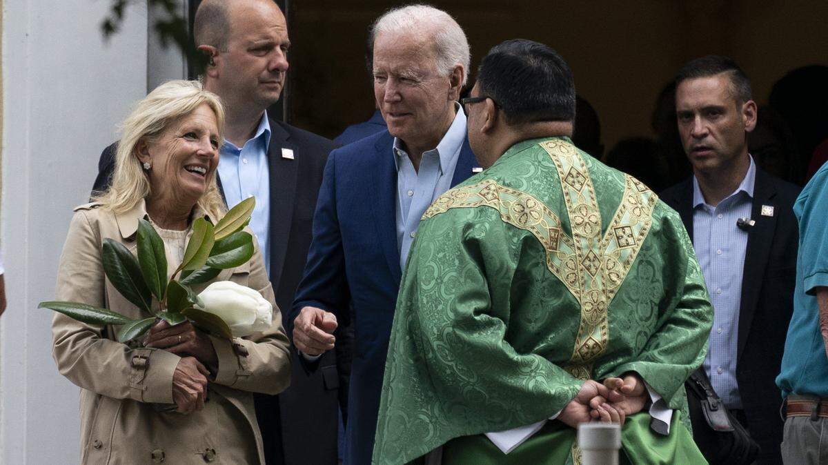 President Joe Biden and first lady Jill Biden speak with a priest as they depart after Mass at St. Joseph on the Brandywine Catholic Church, Saturday, June 19, 2021, in Wilmington, Del. (AP Photo/Alex Brandon)