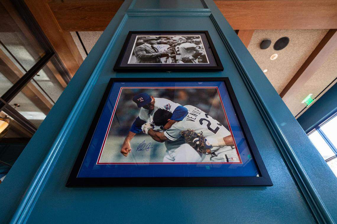 Historical photos of Roger Staubach of the Dallas Cowboys and Nolan Ryan of the Texas Rangers in the ‘arcade room’ at the new Bowie House hotel in Fort Worth on Tuesday, Nov. 28, 2023.