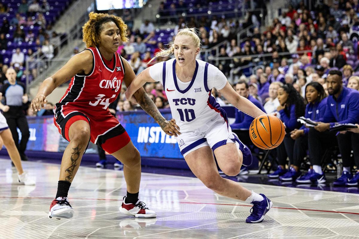 TCU guard Hailey Van Lith (10) drives past Cincinnati guard A’riel Jackson (34) in the second half of an NCAA game between TCU and Cincinnati at Schollmaier Arena in Fort Worth on Saturday, Jan. 4, 2025.
