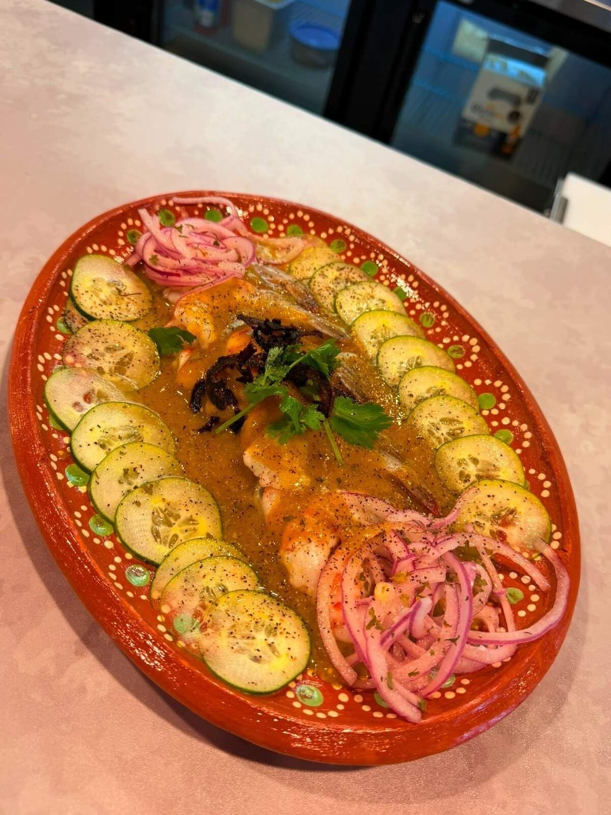 Shrimp Aguachiles at Mariscos Cortez come with customer’s choice of spicy or non-spicy green, red, black or mango habanero sauce.