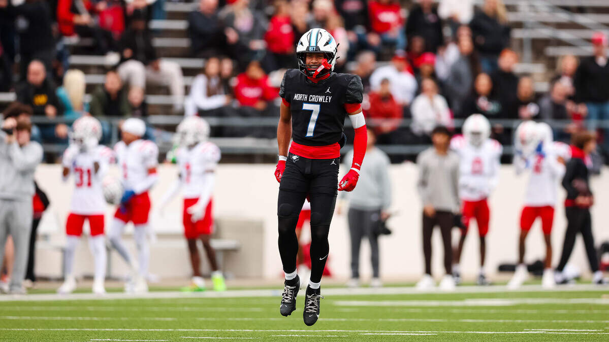 North Crowley safety Elijajuan Houston screams in celebration after deflecting a pass in a Class 6A Division I regional playoff against Coppell on Nov. 29 at Midlothian ISD Stadium in Midlothian.