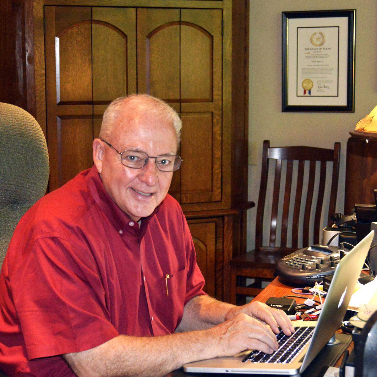 This is the desk where Neil Sperry works seven days a week (unless he’s on sales calls, at family events, or at church). His radio broadcasting equipment is to his left. He’s been work there for 48 years.
