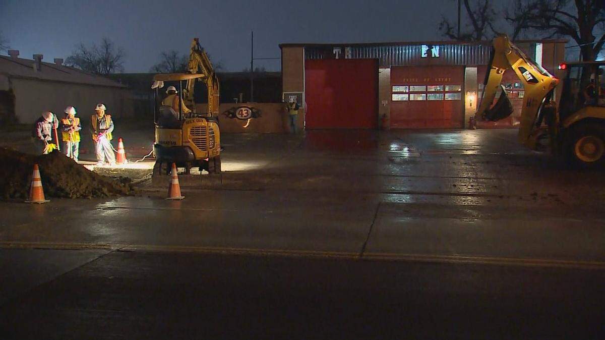 A crew works outside Dallas Fire-Rescue Station 43.