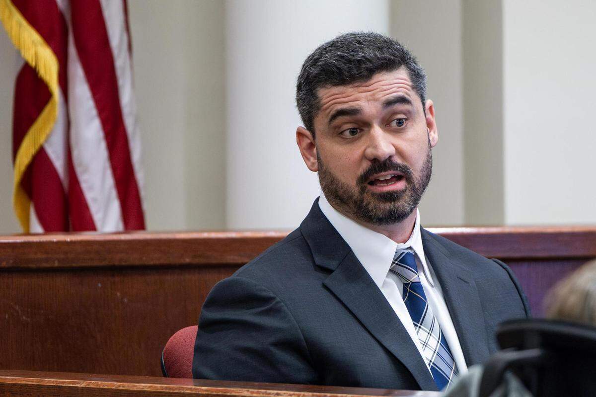 Michael Sones, a Fort Worth Police Department homicide detective, answers questions on the witness stand at Damond Cotton’s murder trial in Tarrant County’s 396th District Court at the Tim Curry Criminal Justice Center on Thursday, March 21, 2024. A jury found Cotton guilty in the 2022 death of Kevin Brown Sr. in Fort Worth.