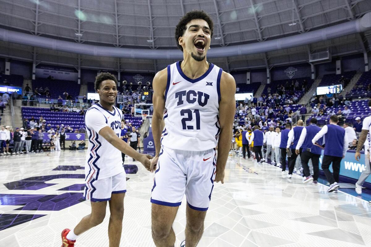 TCu guards Noah Reynolds (21) and Vasean Allette (3) react after winning an NCAA game between TCU and West Virginia 65-60 at Schollmaier Arena in Fort Worth on Wednesday, Feb. 5, 2025.