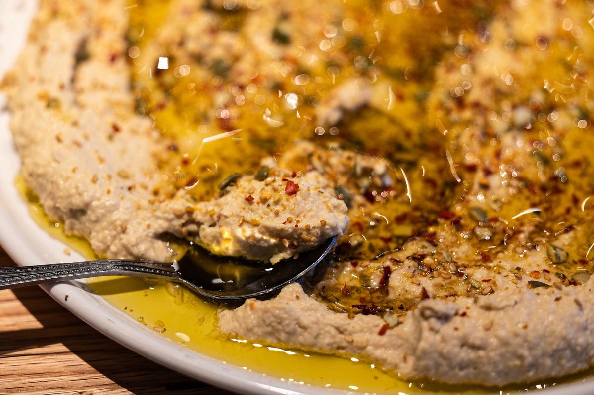 The roasted garlic hummus with zaatar spice and olive oil from the new Whiskey Cake restaurant in Alliance.