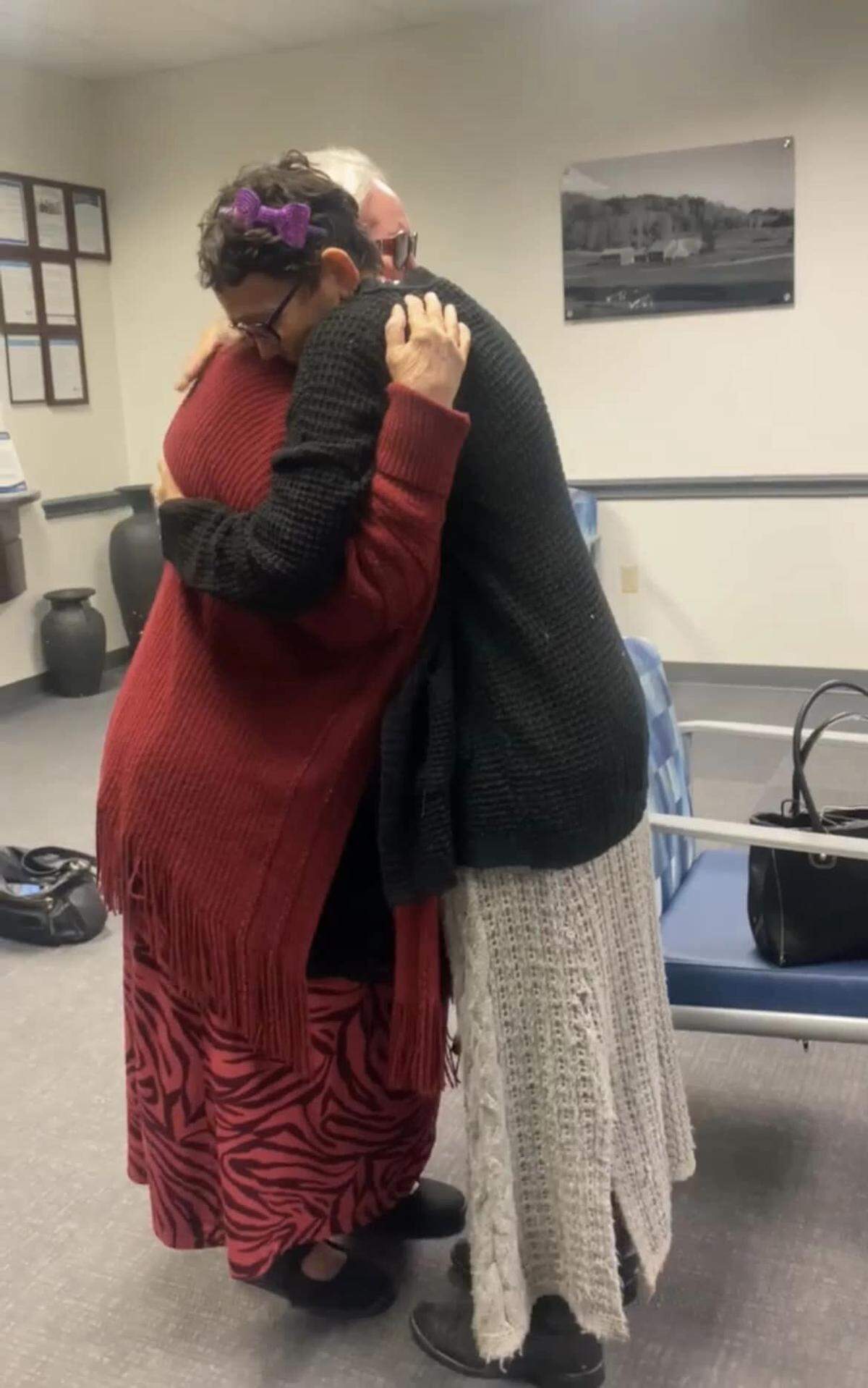 Melissa Highsmith hugs her mother, Alta Apantenco, after the family says they were reunited in Fort Worth, Texas, 51 years after Melissa was kidnapped as a toddler.