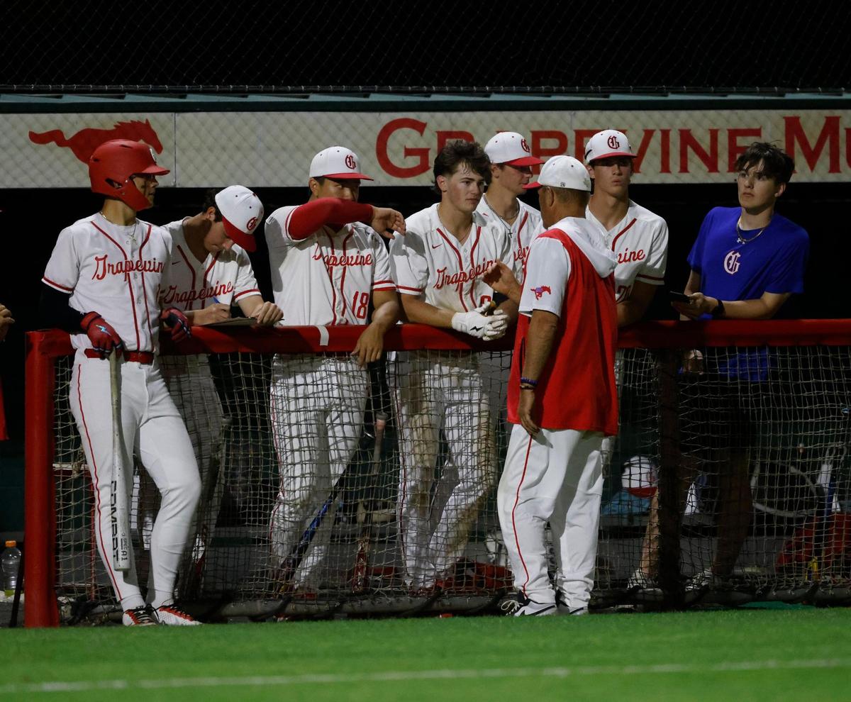 Mustang players including Grapevine pitcher Luke Esquivel (1), Ben Chen and Max Dahlke line up in the dugout during a UIL baseball game at Grapevine Mustang Field in Grapevine, Texas, Thursday, Apr. 17, 2025.