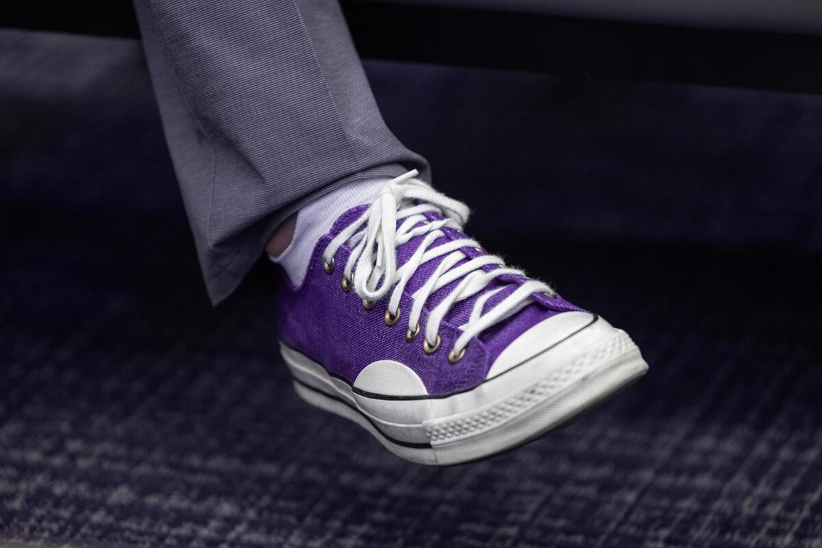 TCU Chancellor Daniel Pullin wears his purple Converse while sitting in The Harrison building on TCU’s campus on Friday, July 11, 2025.