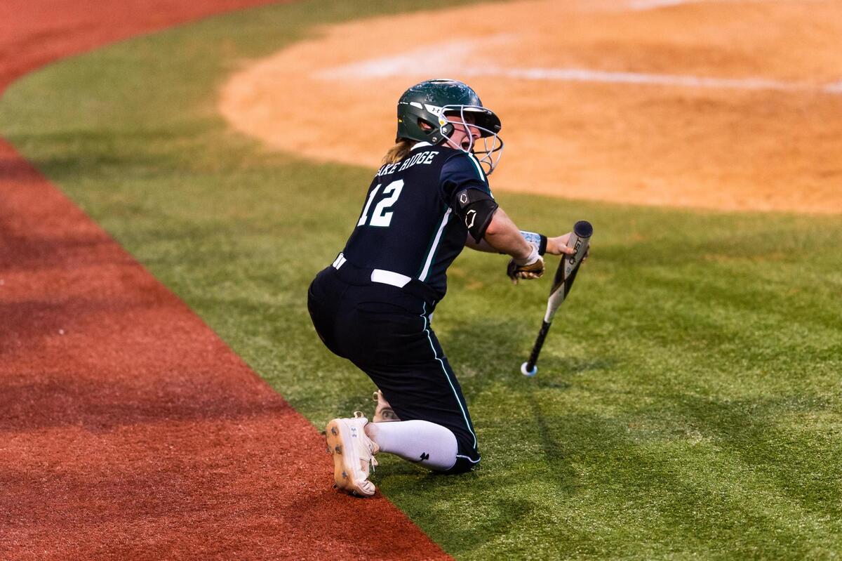Maggie Miller (12) celebrates her teammates hit during the 6A UIL State Softball semifinal between Lake ridge and Deer Park in Austin Texas, on June 3rd, 2021.