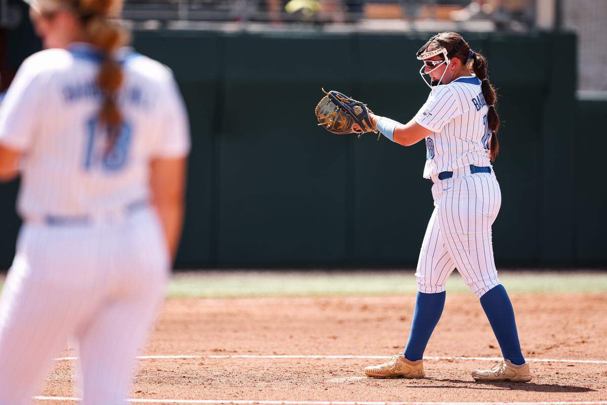 Barbers Hill pitcher Macie Bryant (18) looks at the pitch list on her wrist against Aledo in the UIL Class 5A Division I state softball championship game at Red & Charline McCombs field in Austin, Texas, on Friday, May 29, 2026.