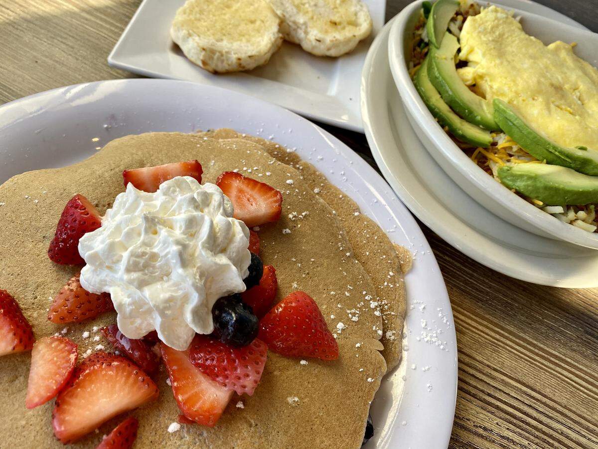 “Berry Blast” multi-grain pancakes and a bacon-avocado skillet at Cafe Republic.
