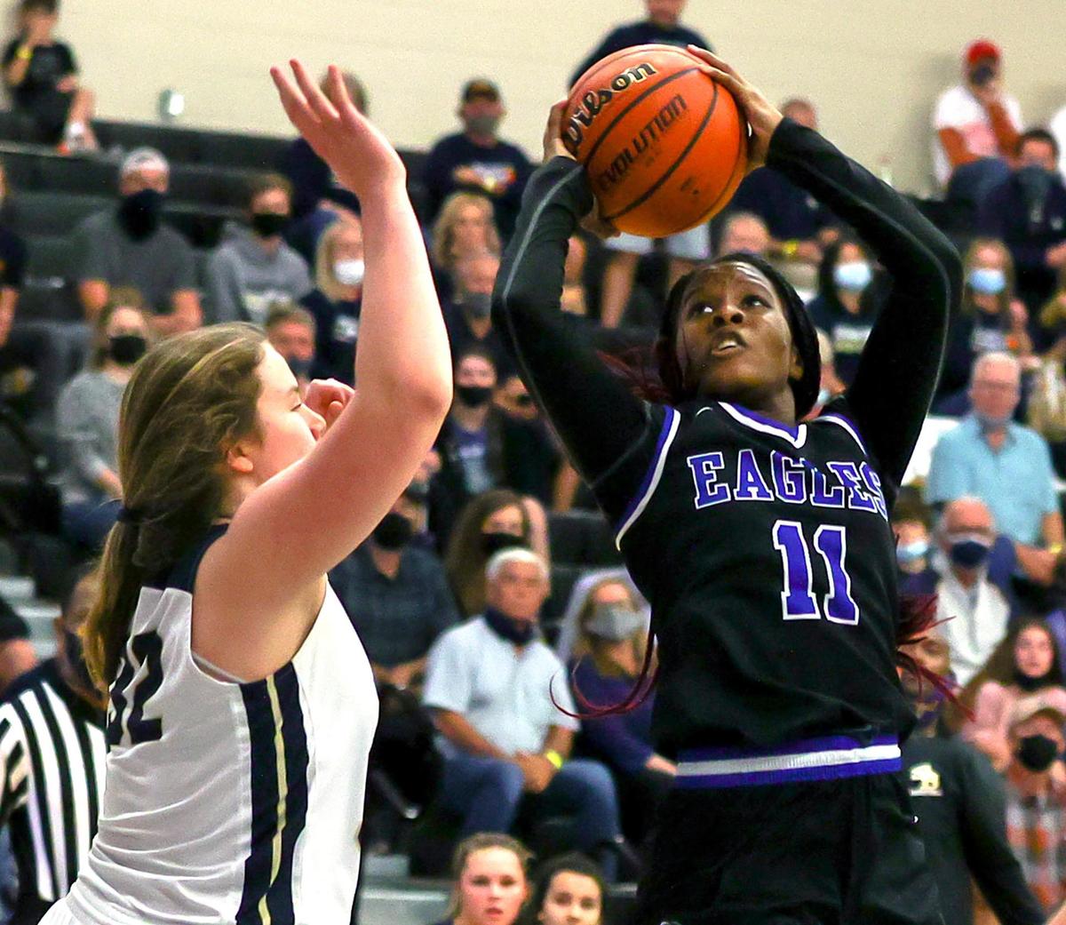 Fort Worth Southwest Christian guard Ariele Rosborough (11) tries to get off a shot over Houston Second Baptist forward Kate Marshall (32) during the first half of the 5A TAPPS Girls Basketball State Championship game played on March 12, 2021 at College Station High School in College Station, TX. (Steve Nurenberg Special to the Star-Telegram)