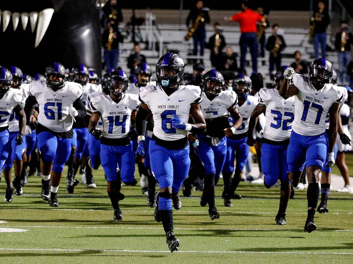 The North Crowley Panthers enter the field to face the Euless Trinity Trojans in a high school football game, Thursday night, November 5, 2020 played at Pennington Field in Bedford, Tx. (Steve Nurenberg Special to the Star-Telegram)