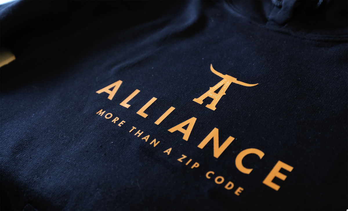 Fort Worth resident Michelle Gibson, a graphic designer, created Alliance-branded merchandise after hearing about the proposed plan to split the Keller school district.