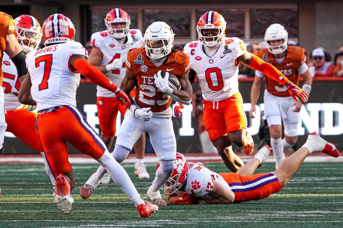 Texas running back Jaydon Blue (23) rushes against Clemson in the first round of the College Football Playoff.