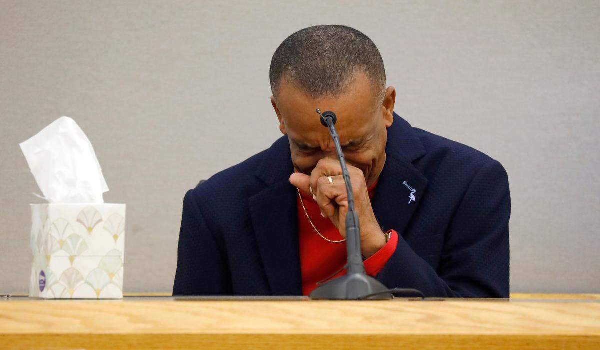 Bertrum Jean, father of Botham Jean, breaks down on the witness stand talking about his son during the punishment phase of the trial of former Dallas police officer Amber Guyger, Wednesday, Oct. 2, 2019 at the Frank Crowley Courts Building in Dallas. Guyger was convicted of murder Tuesday in the killing of Botham Jean and faces a sentence that could range from five years to life in prison or be lowered to as little as two years if the jury decides the shooting was a crime of sudden passion. (Tom Fox/The Dallas Morning News via AP, Pool)
