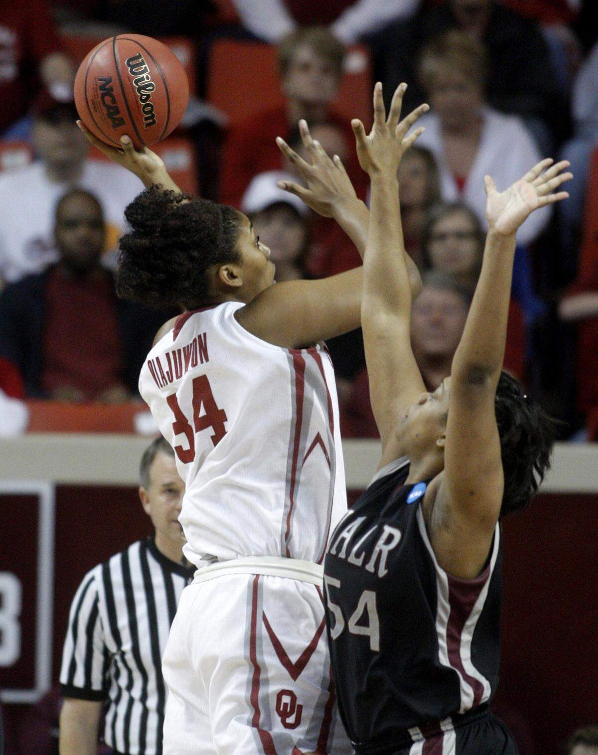 Former Oklahoma center Abi Olajuwon, daughter of Hall of Fame legend Hakeem Olajuwon, was named a TCU assistant coach and recruiting coordinator.