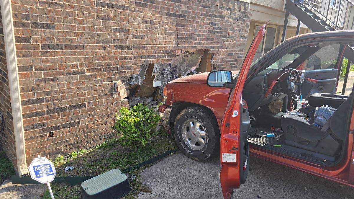Two people were injured and a man was arrested after he crashed his pickup truck into two apartments in North Texas on Monday evening, March 30, police said.