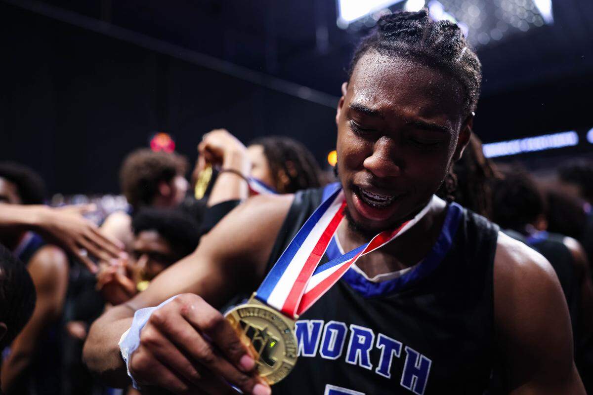 North Crowley forward Alex Barther II holds the gold medal after winning the Class 6A Division I state championship game against San Antonio Brennan on Saturday at the Alamodome in San Antonio.