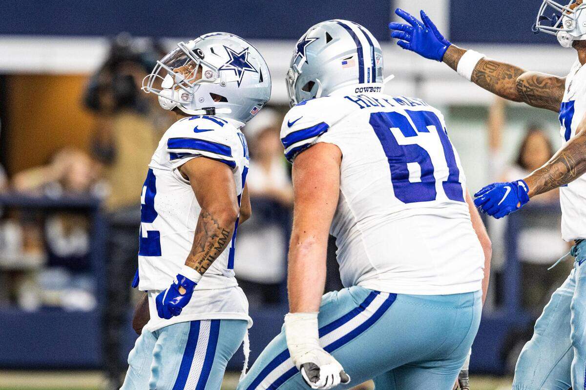 Dallas Cowboys running back Deuce Vaughn (42) celebrates after rushing for a touchdown in the fourth quarter during the first preseason game between the Dallas Cowboys and Jacksonville Jaguars at AT&T Stadium in Arlington, Texas on Saturday, Aug. 12, 2023.