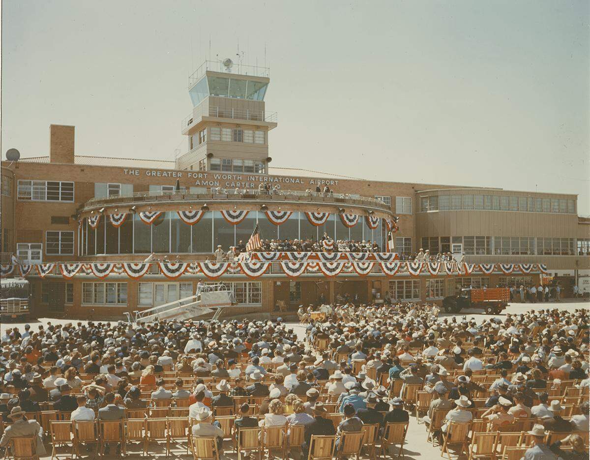 1953: Photograph of the crowd attending dedication ceremonies at Amon Carter Field, Greater Fort Worth International Airport.