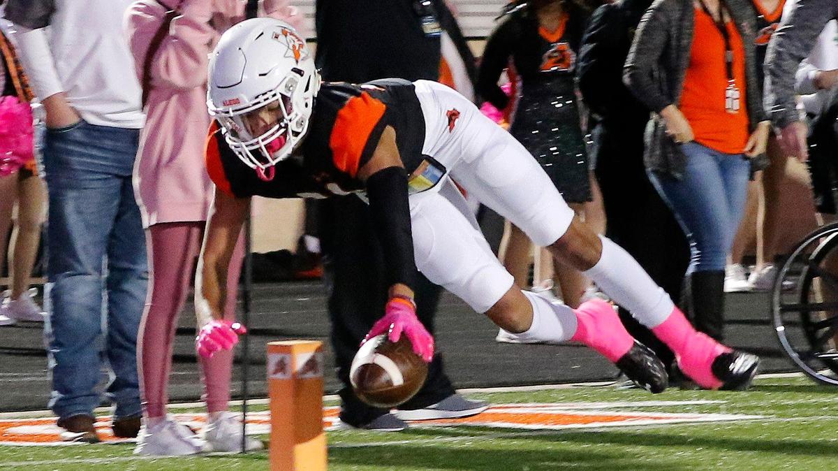 Aledo wide receiver Jalen Pope (11) dives in for an uncontested touchdown in a high school district 5-5A division 2 football game at Bearcat Stadium in Aledo, Texas, Friday Oct. 15, 2021. After a late second quarter Timberview touchdown the score was knotted at 14 at the half. (Special to the Star-Telegram Bob Booth)