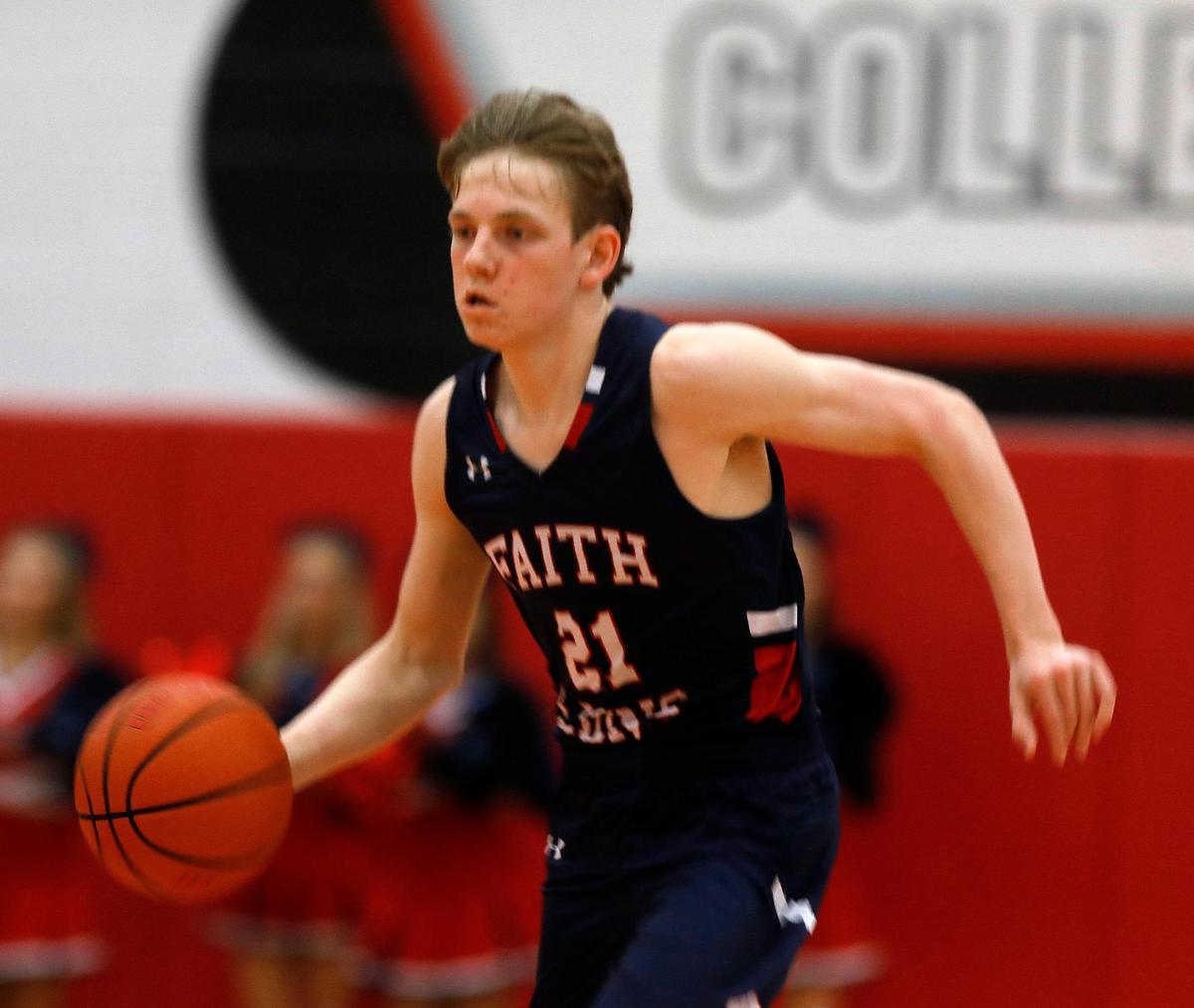 Grapevine Faith’s Josh Davis (21) brings the ball down court during the TAPPS 5A State Semifinal basketball game at Colleyville Heritage High School in Colleyville, Texas, Tuesday, March 09, 2021. Fort Worth Christian led 38-27 at the half. (Special to the Star-Telegram Bob Booth)