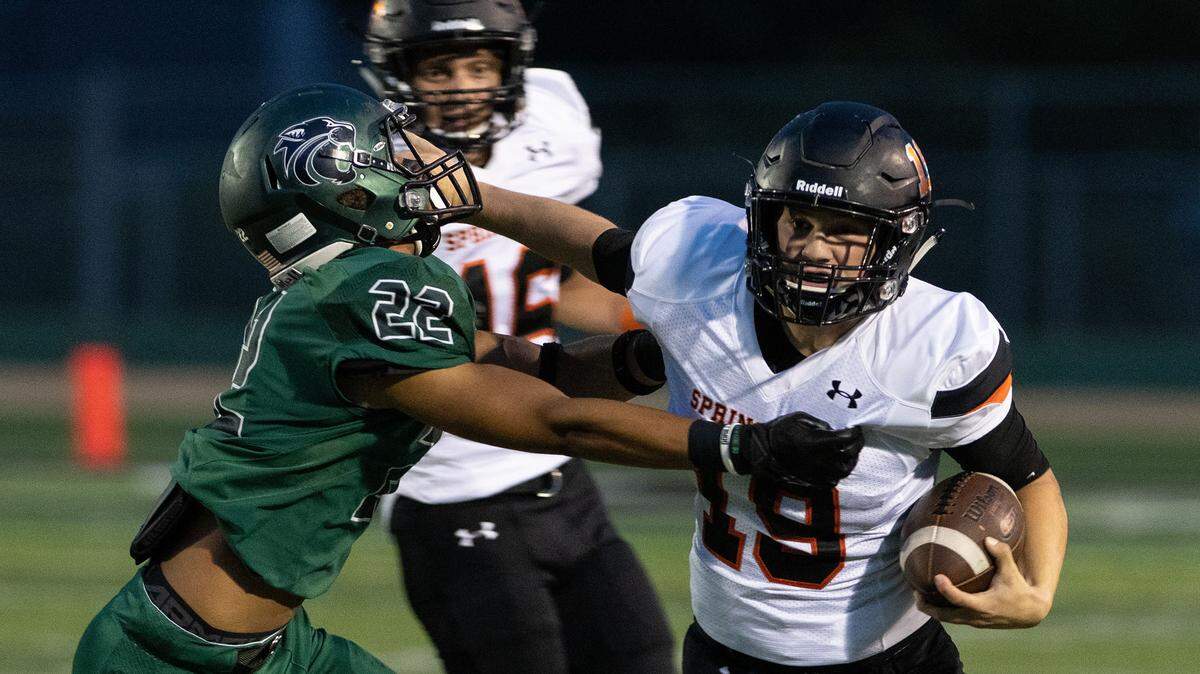 Springtown’s Sawyer Dreary runs for yardage against Kennedale’s (22) JD Coffey during Friday’s game. Springtown prevailed 30-0.