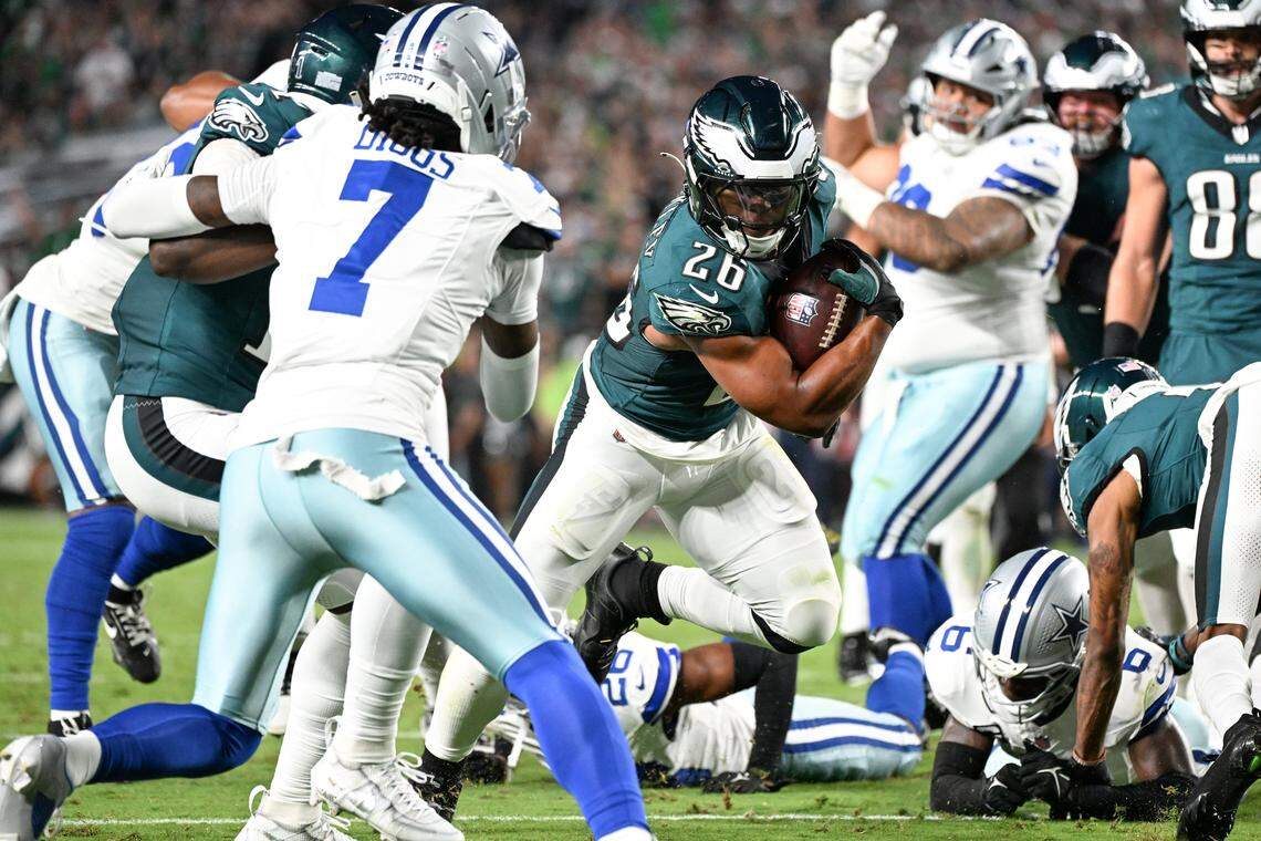 Sep 4, 2025; Philadelphia, Pennsylvania, USA; Philadelphia Eagles running back Saquon Barkley (26) carries the ball against the Dallas Cowboys during the second quarter of the game at Lincoln Financial Field. Mandatory Credit: Eric Hartline-Imagn Images
