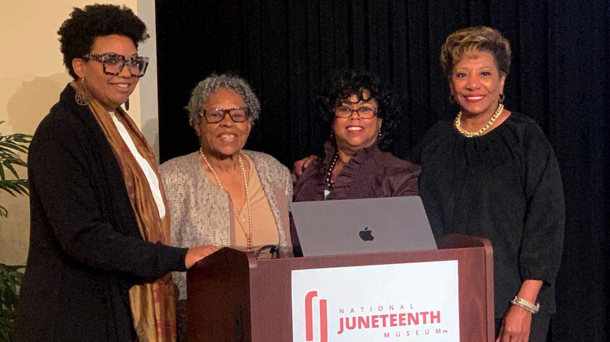 Lauren Cross, left, executive strategist for the National Juneteenth Museum, stands next to activist Opal Lee and members of the museum’s board. Demolition has begun at the construction site, with the museum set to open in 2025.