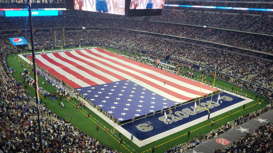 The Dallas Cowboys unveiled a field-spanning American flag for the national anthem before Sunday’s game against the New York Giants at AT&T Stadium. The Cowboys led 10-0 at the half.