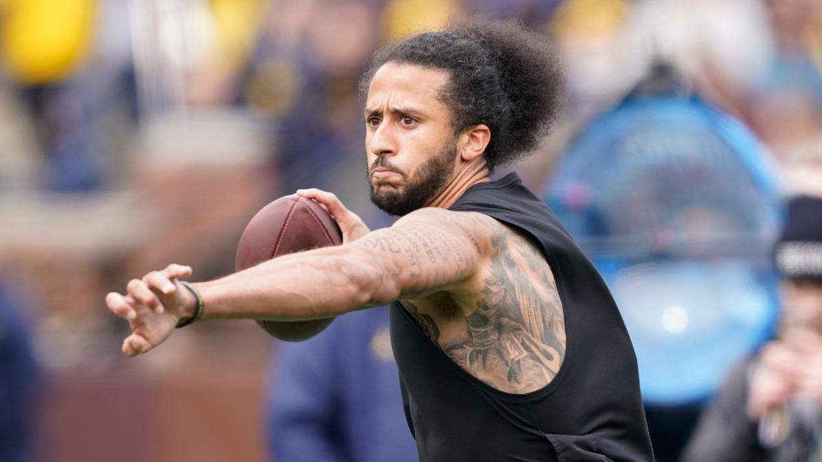Former NFL quarterback Colin Kaepernick throws during halftime of an NCAA college football intra-squad spring game, Saturday, April 2, 2022, in Ann Arbor, Mich. (AP Photo/Carlos Osorio)Colin Rand Kaepernick