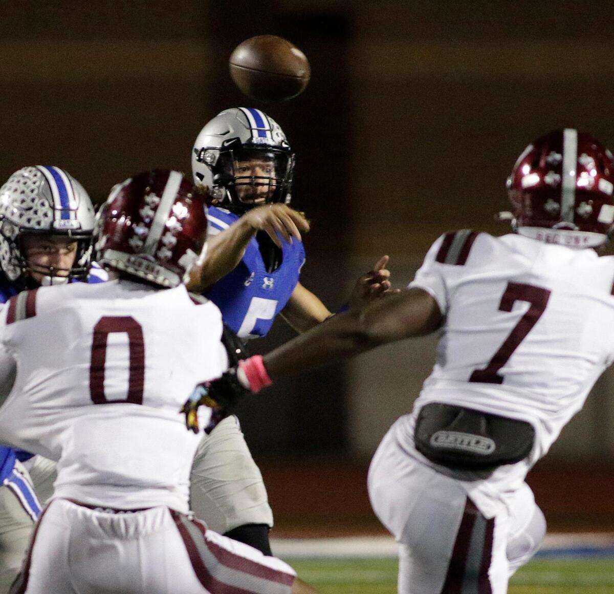 Burleson’s Jacob Torres throws a pass during a UIL football game at Burleson ISD Stadium on Friday October 25, 2024.