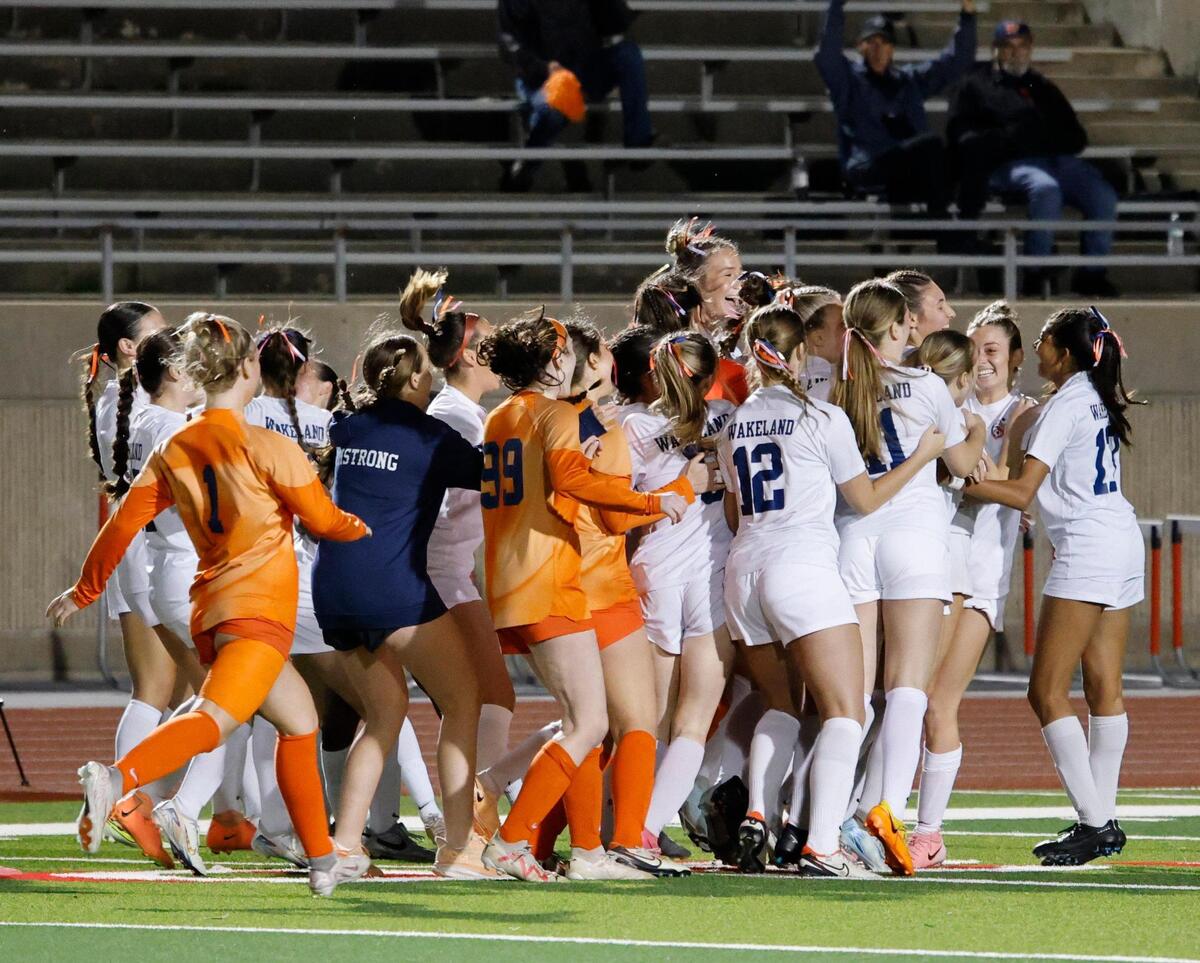 The Wolverines celebrate winning the Class 5A D2 UIL state semifinal girls soccer playoff game at Buddy Echols Field in Coppell, Texas, Friday, Apr. 05, 2025.