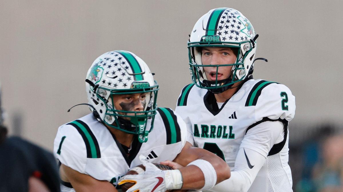 Southlake running back Riley Wormley (1) takes the handoff from quarterback Angelo Renda (2) during a UIL 6A Conference football game at Pennington Field in Bedford Texas, Friday, Sept. 20, 2024.