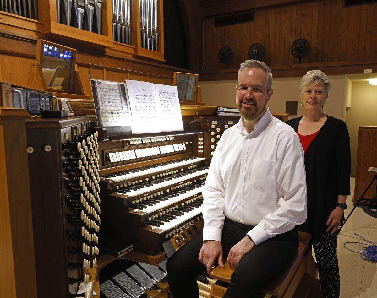 St. Stephen Presbyterian Church organist Jordan Smith and Pastor Rev. Dr. Elizabeth J. Callender with their 1970 era refurbished organ at St. Stephen Presbyterian Church in Fort Worth, Texas, Wednesday, Sept. 10, 2025.
