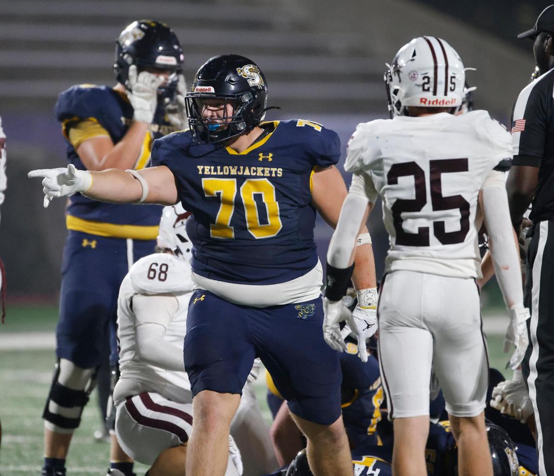Stephenville defensive lineman Kolton Dearth (70) signals first down after running the ball on a 4th-and-one during a UIL District 4-4A D1 football game at Tarleton State Memorial Stadium in Stephenville, Texas, Friday, Nov. 01, 2024.