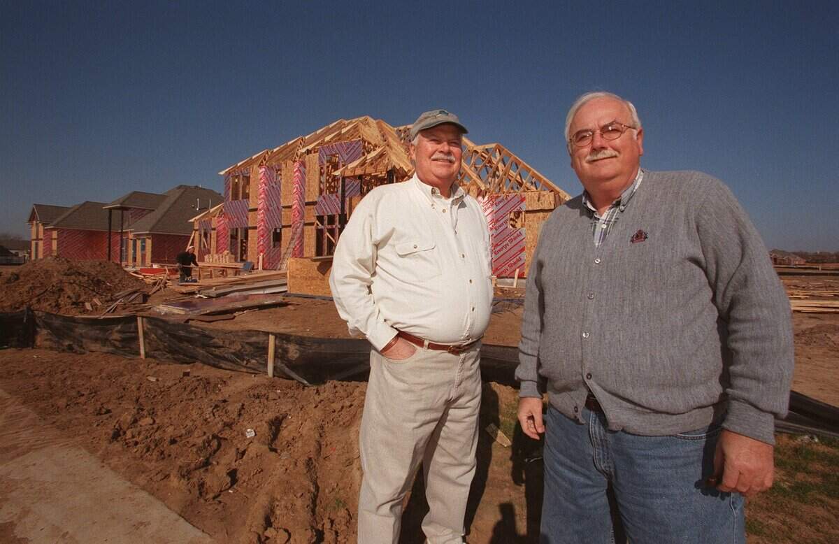 Donald Anderson, left, and partner Rich Robbins, of Conn-Anderson Inc., a building and design company, at Southlake's Timmaron. Behind them are some of the custom homes they are building.