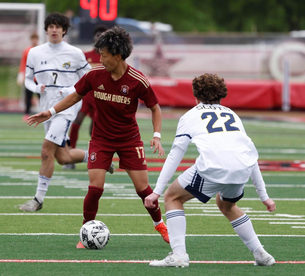 Saginaw Pelun Wadam (17) side kicks in front of Highland Park defender Brian Gurtowski (22) during the Class 5A D2 UIL state semifinal boys soccer playoff game at Buddy Echols Field in Coppell, Texas, Saturday, Apr. 05, 2025.
