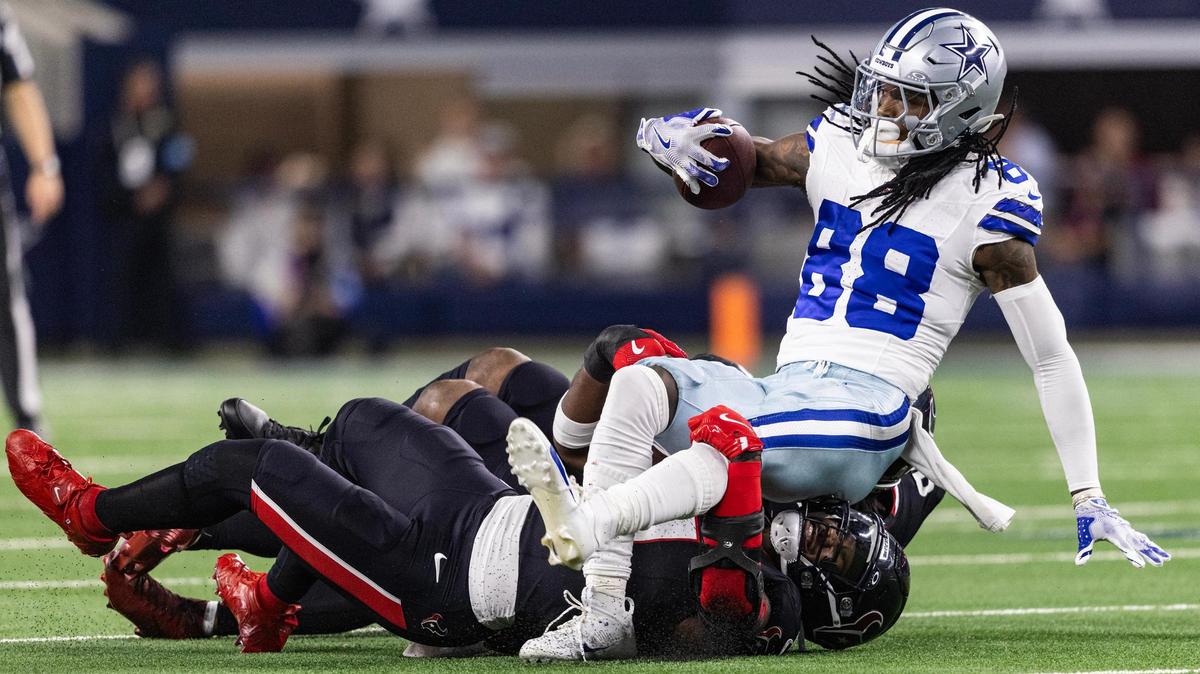 Cowboys wide receiver CeeDee Lamb (88) is tackled after a reception in the second quarter of an NFL game between the Dallas Cowboys and the Houston Texans at AT&T Stadium in Arlington on Monday, Nov. 18, 2024.