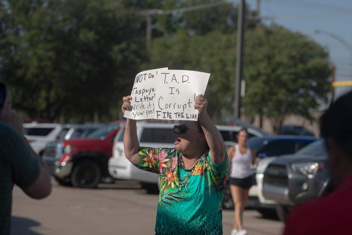 A person supporting Chandler Crouch before the emergency board meeting at Tarrant Appraisal District on Thursday, June 30, 2022, in Fort Worth, Texas.