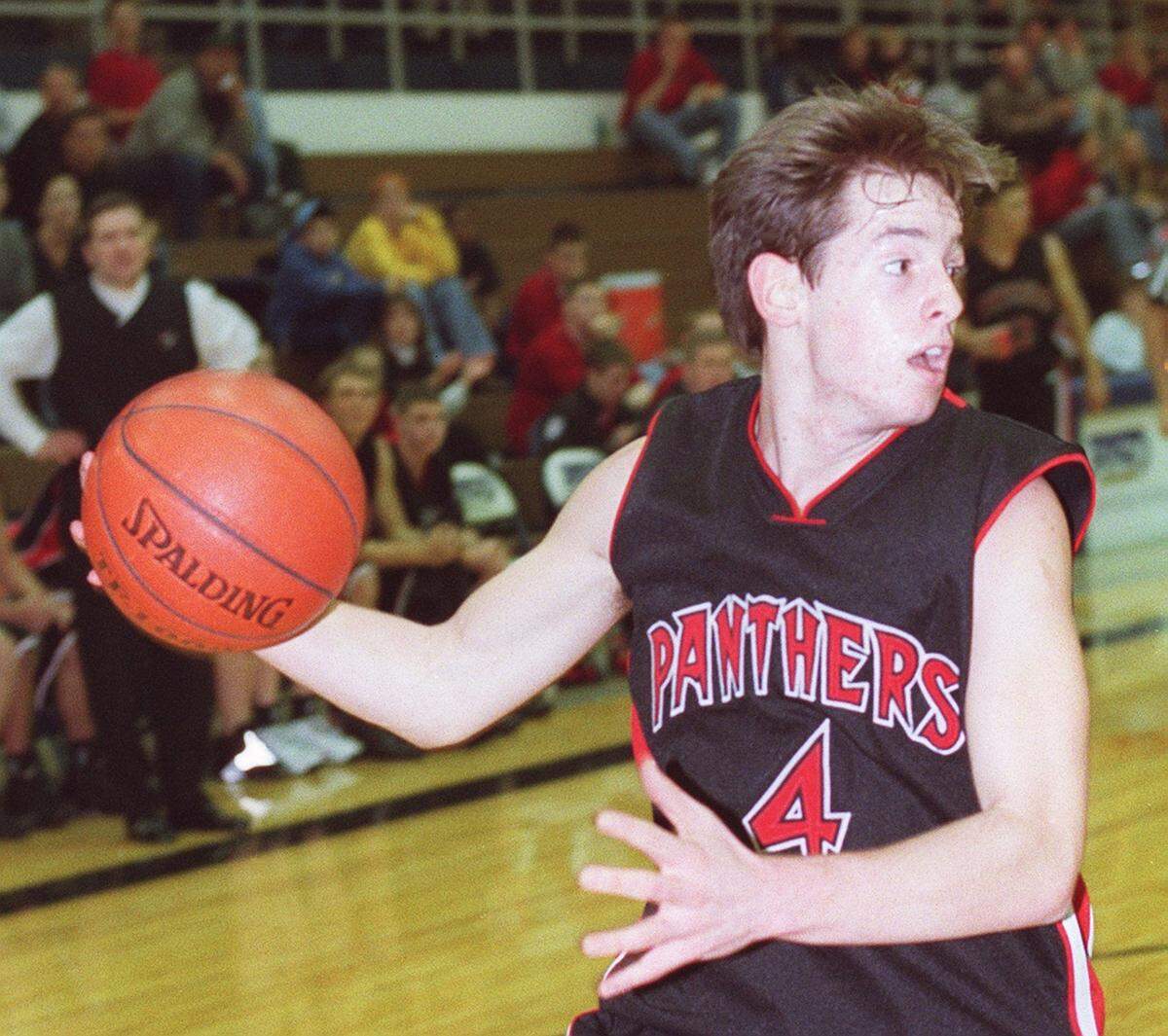Colleyville guard David Markley #4, prepares to pass the ball during a game against Richland Thursday, Jan. 3, 2002 at Thomas Coliseum in Haltom City.