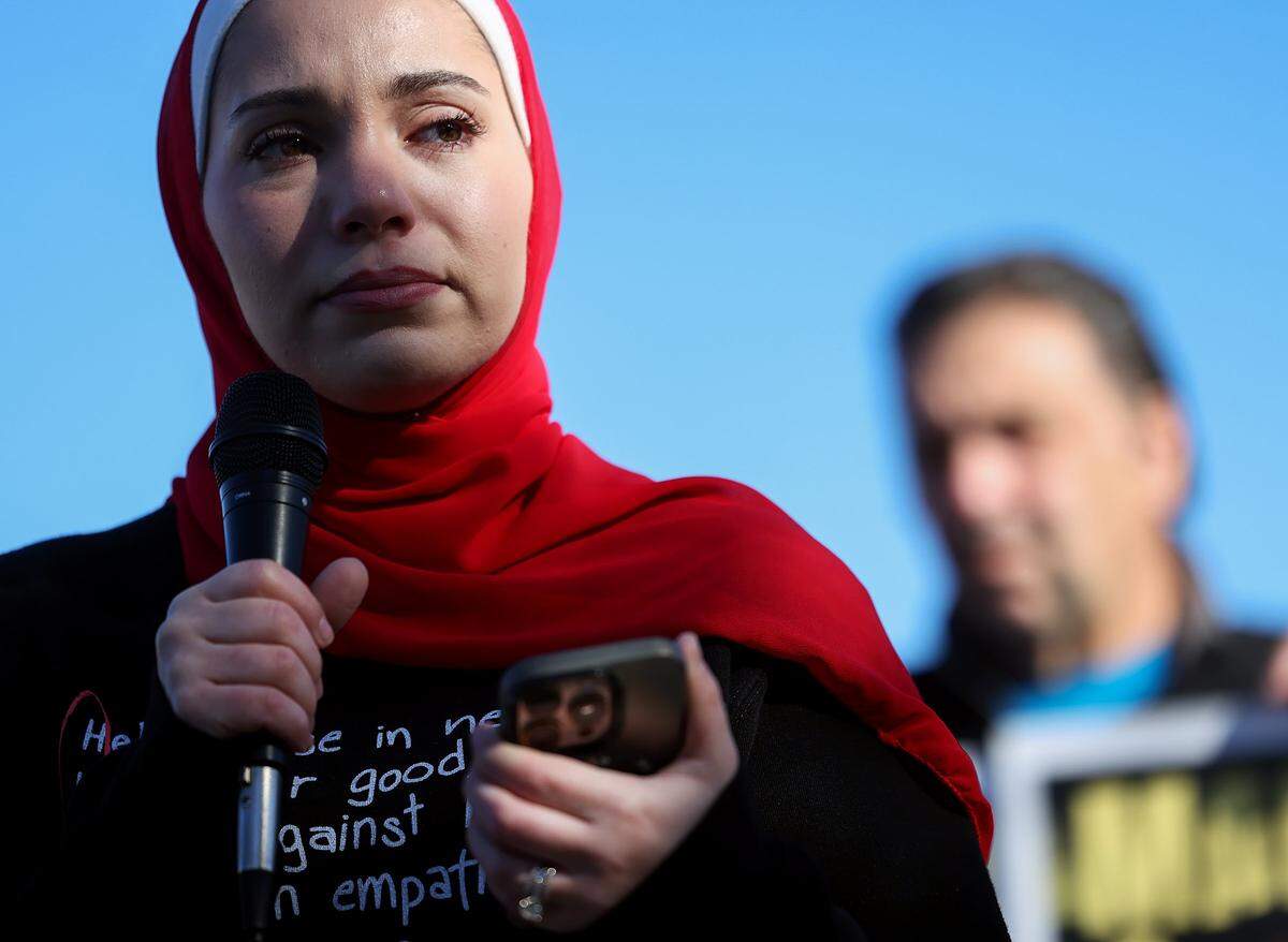 Shahd Arnaou speaks during a press conference on Tuesday, Dec. 30, 2025, to call for the release of Maher Tarabishi, her father-in-law, from Bluebonnet Detention Center on humanitarian grounds. Tarabishi is the primary caregiver for son, Wael, who is living with advanced Pompe Disease which requires 24-hour care.