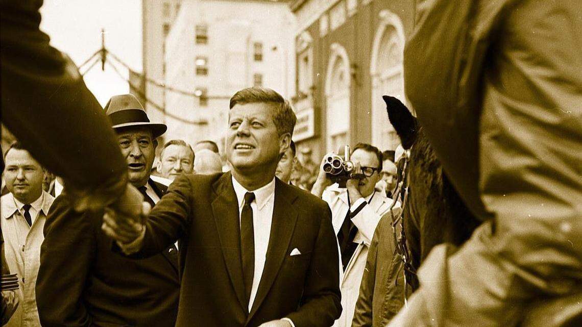 President John F. Kennedy greeted Fort Worth law enforcement crowd control officers who were on horseback in front of the Hotel Texas during his visit on Nov. 22, 1963.