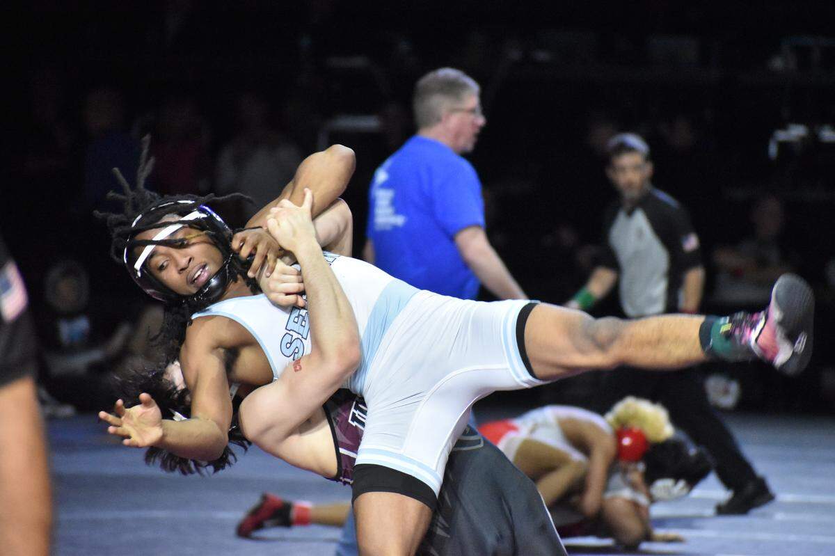 Arlington Seguin’s E’Shawn Tolbert competes in the UIL state wrestling championships in Cypress, Texas on Feb. 17, 2024.