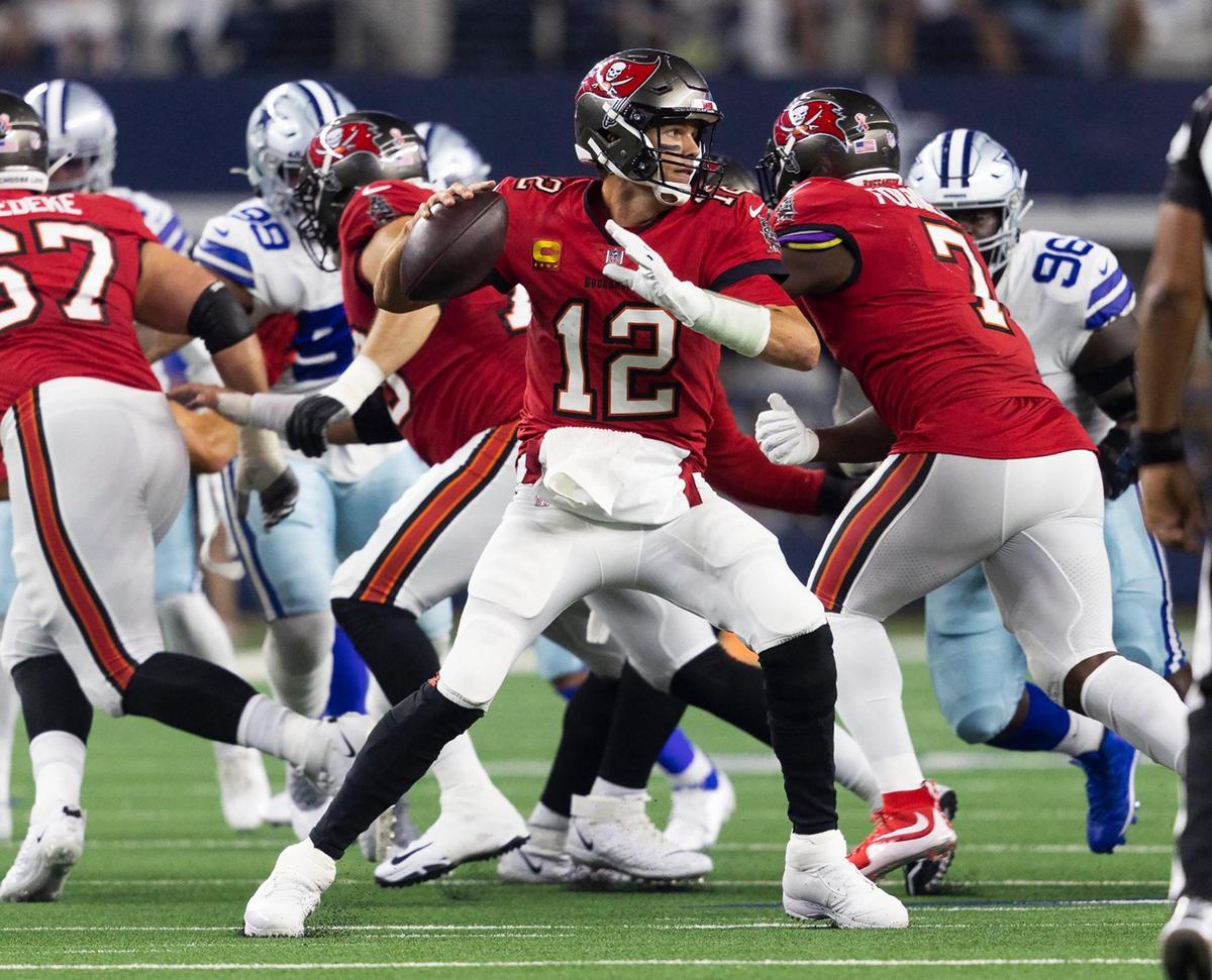 Tampa Bay Buccaneers quarterback Tom Brady throws the ball during the 2022 season opener against the Tampa Bay Buccaneers on Sunday, September 11, 2022, at AT&T Stadium in Arlington.